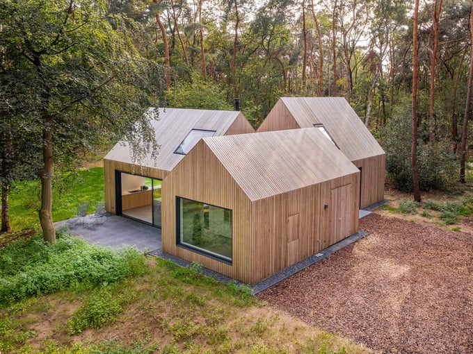 Residential architecture blending with forest landscape – In a green embrace